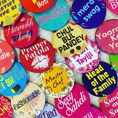 A colorful collection of our quirky and fun badges, perfect for weddings and parties. With phrases like 'Proper Patola' and 'Chulbul Pandey', these are great icebreakers for any sagan or shaadi event.