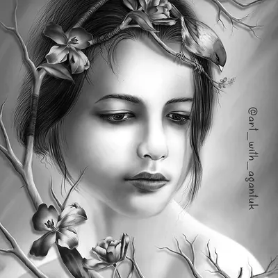 This is an older drawing of mine that falls into the Surrealism art style. It explores the connection between humanity and nature, blending a portrait with elements like branches and birds to create a dreamlike image.