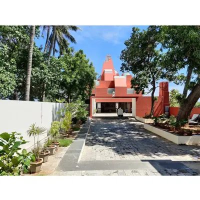 The entrance to the Sai Temple in Trichy, a project where we explored how to create a modern spiritual space. The design uses a ritualistic path, transitioning from light to dark and from open to enclosed, to guide the devotee towards the sanctum.