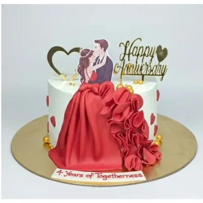 A stunning anniversary cake featuring a dramatic red fondant skirt. This is a rich, eggless chocolate indulgence truffle cake, perfect for celebrating four years of togetherness.