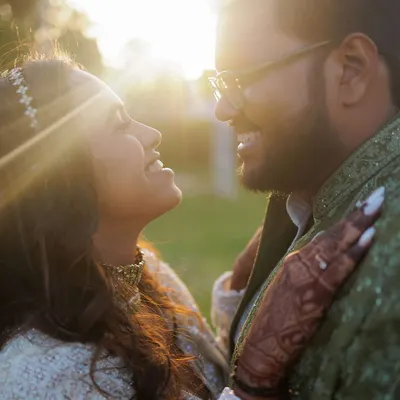 An intimate, sun-kissed portrait of a newly engaged couple. We specialize in finding those quiet, in-between moments filled with genuine smiles and affection.