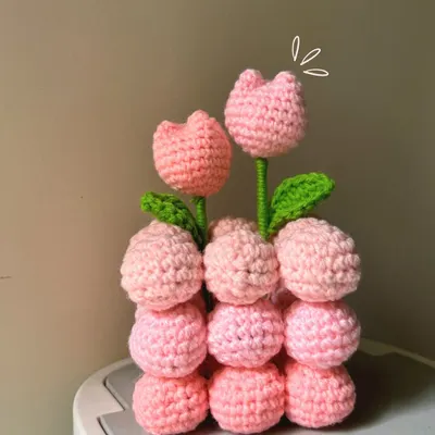 I went a little overboard and made a whole crochet tulip pot! This pot of pink tulips will stay in bloom forever.