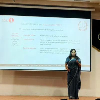 On stage, delivering a presentation on the POSH Act. The slide behind me details the mandatory constitution of an Internal Committee, a critical first step for any organization to ensure compliance and provide a safe redressal mechanism for employees.