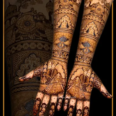 A complete bridal mehendi design featuring a bride figure on the palms. This is a perfect example of the full, story-driven designs we create for our brides.