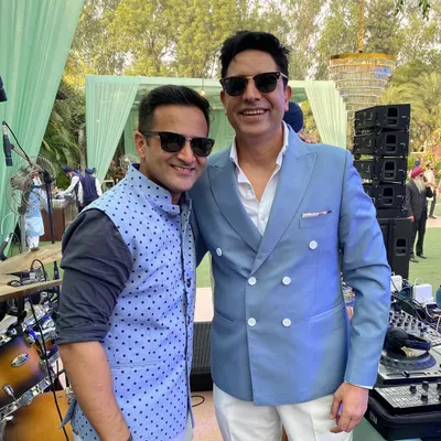 It's always a pleasure to share the stage with my brother and fellow artist. Our shared energy and love for music are what make these day weddings so sublime and memorable.