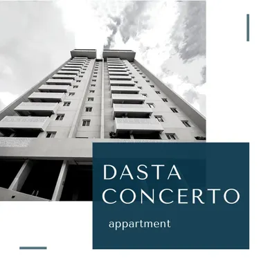 The Dasta Concerto apartment building, designed to cater to the growing IT community near Whitefield and Electronic City. The strong vertical lines and minimalist facade create a modern and imposing silhouette.