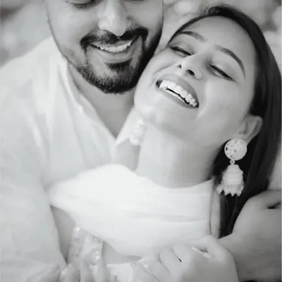 This black and white close-up is all about pure, uninhibited joy. Capturing this kind of genuine laughter is my ultimate goal, as it creates a timeless memory of happiness.