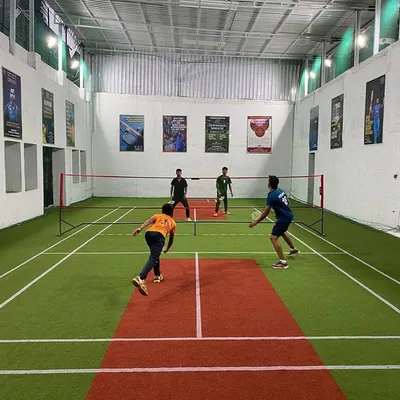 A great view of a doubles match getting started at our Sion court. This is where players of all levels come to enjoy the game.