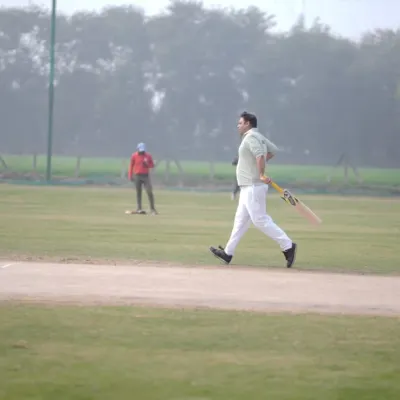 I believe that age is just a number, and staying active is key. Here I am enjoying a game of cricket, a great way to maintain cardiovascular health, flexibility, and social connections.