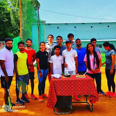We are more than just a team, we are a family. Here is our group celebrating a birthday together on the court after a training session.