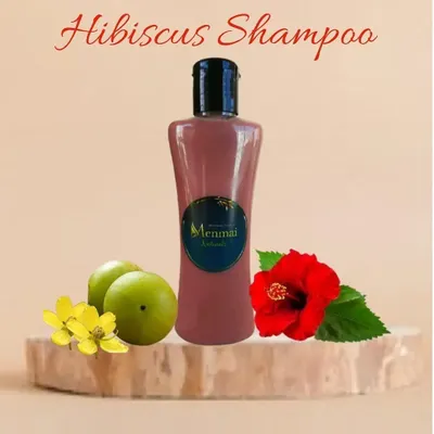 This is my Hibiscus Shampoo, made with fresh hibiscus flowers and leaves. It is perfect for treating dandruff, preventing premature greying, and conditioning dry or frizzy hair to make it healthy and thick.