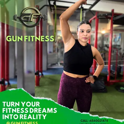 A member stretching before her workout. Turning your fitness dreams into reality starts with showing up and putting in the work.