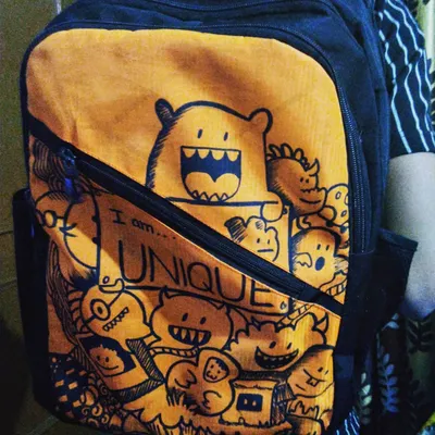 Here is the customized doodle backpack being worn. It's a fun way to make an everyday item a unique piece of wearable art.