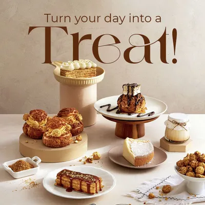 A beautiful display of our patisserie offerings, from choux pastries to cheesecakes and eclairs. I craft each dessert to be a perfect treat that turns any day into a special occasion.