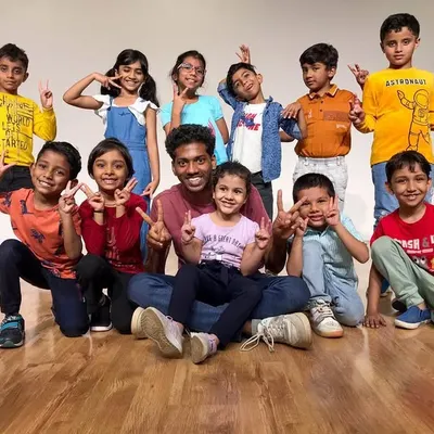 This is what our dance family looks like. A happy group of our students with their instructor after a great session, showcasing the supportive and fun community we build here.