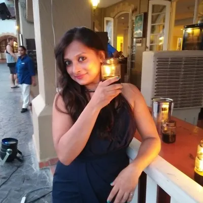 A professional shot of me, ready to host. With over a decade of experience and more than 500 weddings hosted, I bring energy, enthusiasm, and a personal touch to every sangeet, corporate conference, or private party.