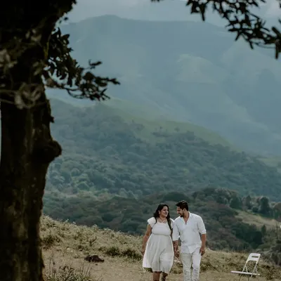 A romantic walk through the rolling hills. We use the vastness of nature to create a sense of intimacy and adventure in our pre-wedding photography.