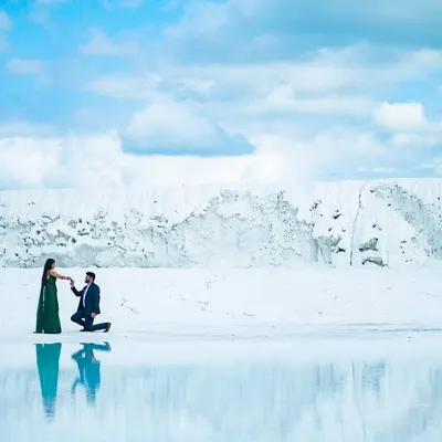 A proposal against a surreal, snow-like landscape. We specialize in finding unique locations for pre-wedding shoots that result in breathtaking, once in a lifetime images like this.