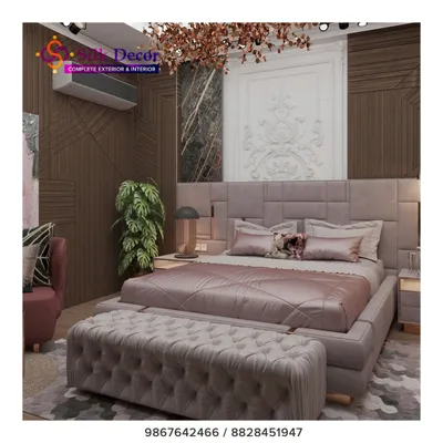 We designed this bedroom to be a true sanctuary. The centerpiece is a large, custom-upholstered bed in a sophisticated grey fabric, paired with a matching deep-tufted bench at its foot. This project highlights our ability to create coordinated bedroom sets that balance modern design with plush comfort.