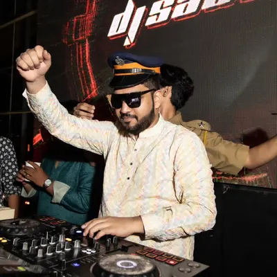 Here I am in my element at a Sangeet, mixing tracks and keeping the vibe alive. I love to have fun with the theme and make sure the music is non-stop.