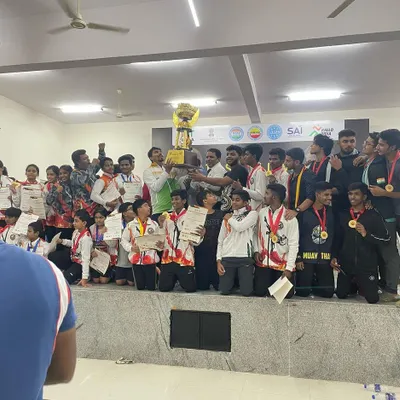 The entire Thunder Martial Arts team celebrating a major victory. This trophy represents the collective effort and success of every fighter in our gym.