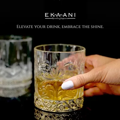 Elevate your drink, embrace the shine. Here is to new beginnings, timeless toasts, and the perfect pour. My crystal whiskey glass with an ornate gold base is designed for savoring life's best moments.