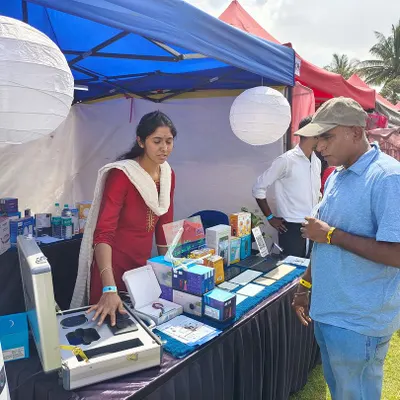 A member of our team provides a hands-on demonstration of our smart lock features to an interested visitor at a community event. We are always happy to answer questions and show how the technology works.