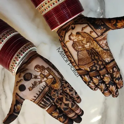 A classic Karwa Chauth design featuring a couple's portrait on one hand and a woman with a pot on her head on the other. The red bangles add a traditional touch.