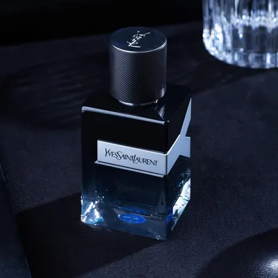 When I shot this YSL perfume, I knew I had to convey everything about the scent through photography. The moody, dark setting with a hint of blue light gives it a mysterious and masculine feel.
