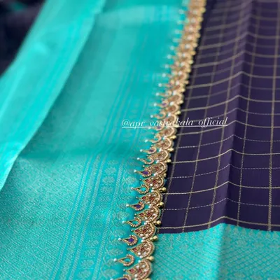 An elegant saree border featuring delicate kemp-style embroidery with pearl details.