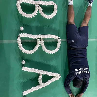 A creative shot of our academy's identity, B.B.A., made from shuttlecocks. This represents the hard work and thousands of shots that go into building a champion.