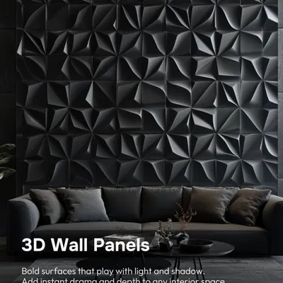 3D wall panels are perfect for creating a dramatic statement. These bold, black panels play with light and shadow, adding instant depth and a powerful modern feel to this living room.