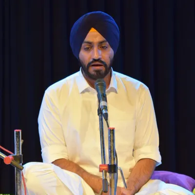 A close-up of one of our senior students leading a Kirtan performance on stage. We train our students to be confident and expressive performers.