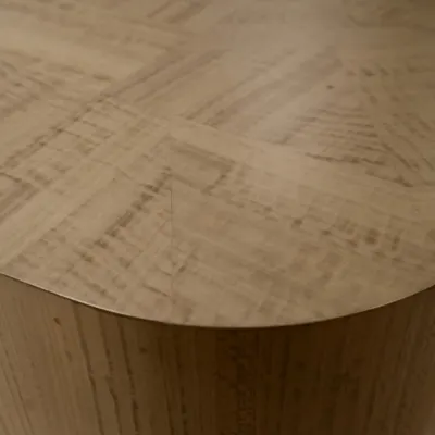 We consider this coffee table a piece of art. It was created by meticulously stitching together small pieces of veneer in different shapes and sizes, resulting in a beautiful, textured surface with a unique pattern.