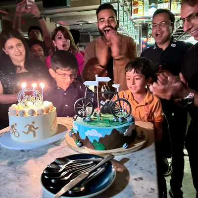 Celebrating a birthday the DC way! A member's special day is marked with not one, but two amazing cycling-themed cakes surrounded by friends and family.