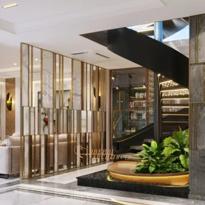 This central atrium is an experience in itself, with a dramatic interplay of textures, a mirrored partition, and a spiral staircase wrapping around a green planter.