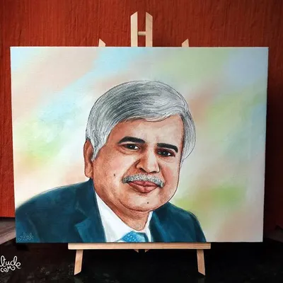 A distinguished portrait painted on canvas and displayed on an easel, a perfect premium gift for a boss or mentor.
