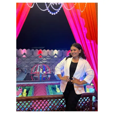 This is me, Supriya, on-site at a grand wedding event. I personally oversee the details to ensure everything is perfect. My motto is "Do it with passion or not at all."