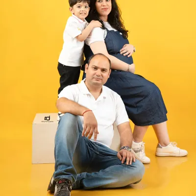 A beautiful family portrait, with the big brother-to-be getting a special hug. I always make sure the older sibling feels like a star during our family maternity sessions.