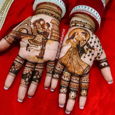 A perfect example of modern personalization. This bride wanted to include her love for travel and romance, so I created custom portraits of the couple in Paris and dancing, making her mehandi truly unique.
