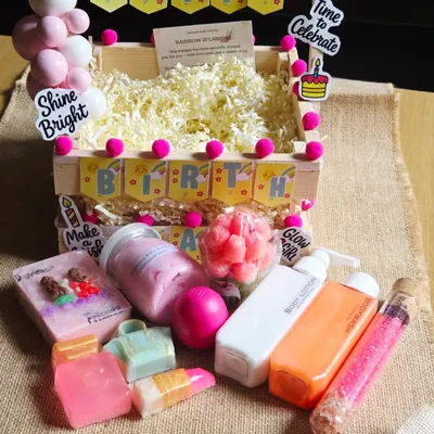 A complete birthday celebration in a box. This vibrant hamper is filled with an assortment of my handmade soaps, body lotion, body wash, and bath salts, all packed into a festive crate.