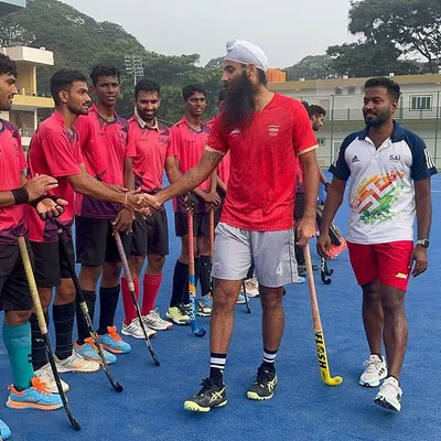Indian hockey star Jarmanpreet Singh personally congratulating my players after a tough match. This kind of interaction is incredibly motivating for young athletes.