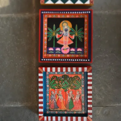 A set of three modular Pichwai blocks, designed to be stacked vertically. This format allows for a flexible and modern display of traditional art.