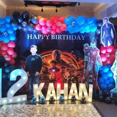 Another shot of the Avengers party, showing the birthday boy with his favorite heroes. We ensure the lighting and props are perfectly placed for great photos.