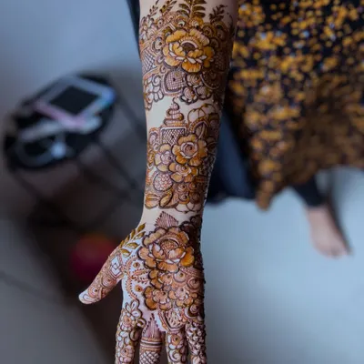 A perfect example of my signature floral design. This full-arm piece showcases a variety of flowers, from bold roses to delicate buds, all shaded for a 3D effect.