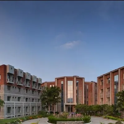 The full campus view of the Institute for Studies in Industrial Development (ISID) in New Delhi. The design connects multiple buildings with open spaces, creating a collaborative environment. The use of exposed brick and stone is a core part of my philosophy for sustainable, low-maintenance public buildings.