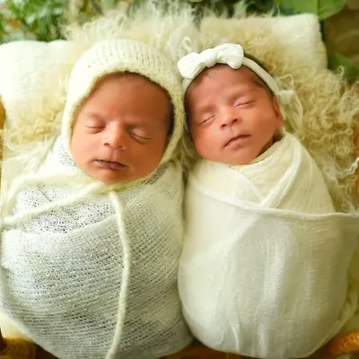 Double the sweetness. As a certified newborn photographer, I specialize in safely posing twins to capture their connection, like this adorable shot of two peacefully sleeping babies.