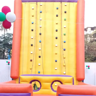 The full inflatable climbing wall, ready for action. It's a safe and exciting challenge for kids and teens at birthday parties or carnivals.