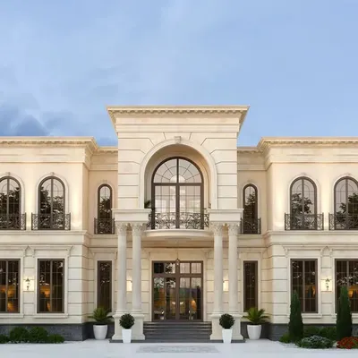 The full front elevation of the neo-classical bungalow in Chattarpur, New Delhi. This image captures the scale and symmetry of the architecture, a hallmark of our turnkey construction services.