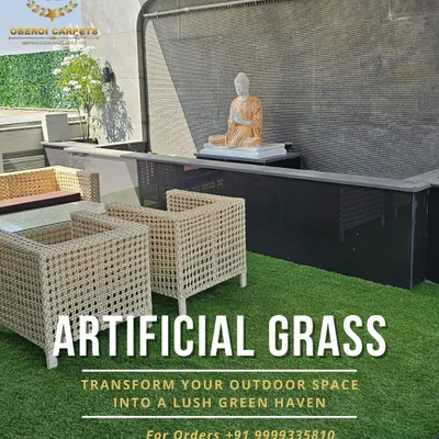 This is a perfect example of a complete terrace makeover. I used my high-density artificial turf to create a soft, inviting lawn area that is completely pet-safe and kid-friendly. It provides a beautiful green contrast to the stone water feature.